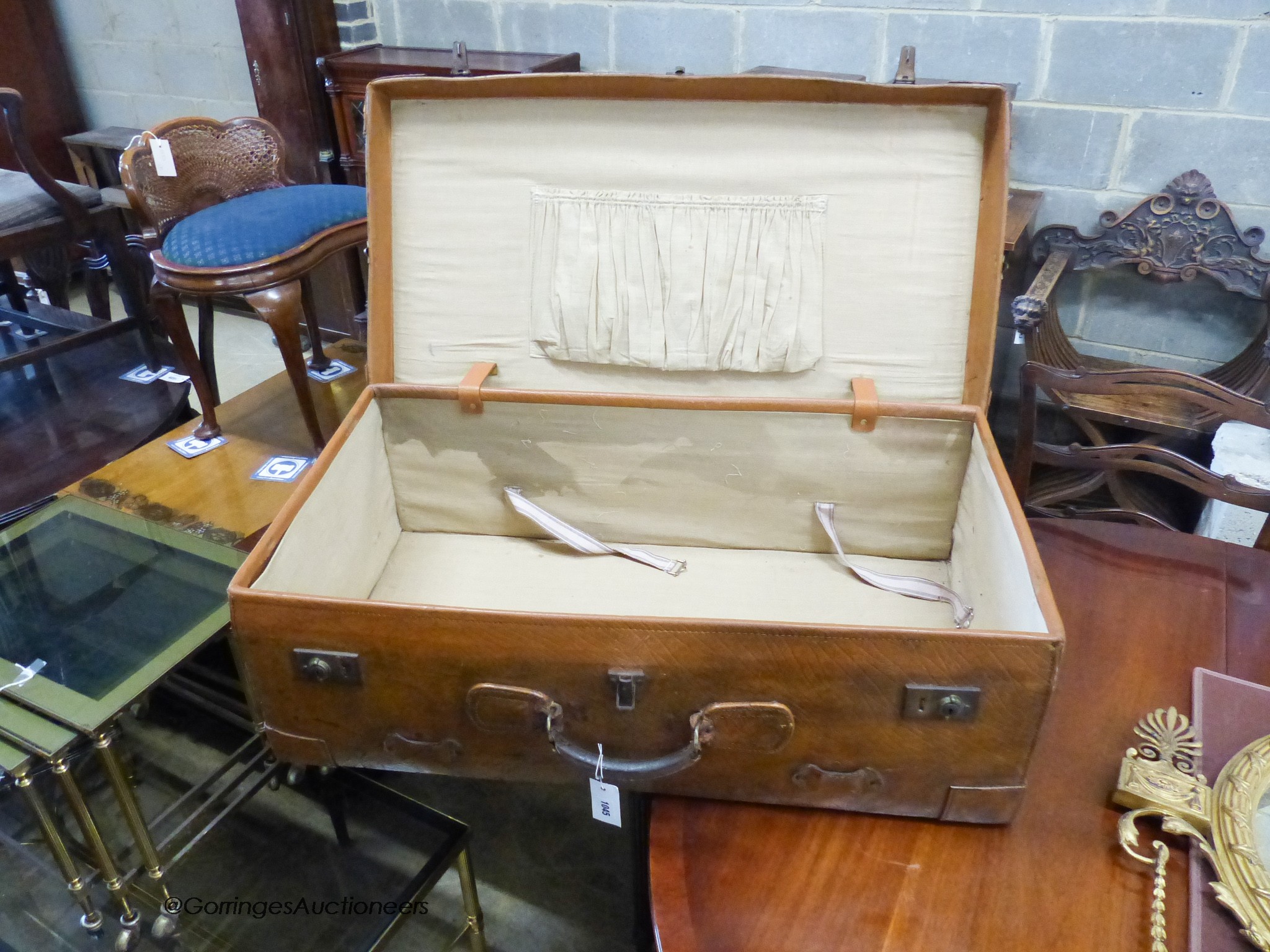 A Victorian tan leather travelling trunk. W-90, D-50cm.